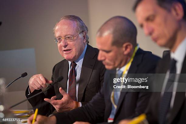 Paolo Scaroni, chief executive officer of Eni SpA, left, speaks as Roberto Albini, the company's press officer, center, and Giuseppe Recchi, chairman...