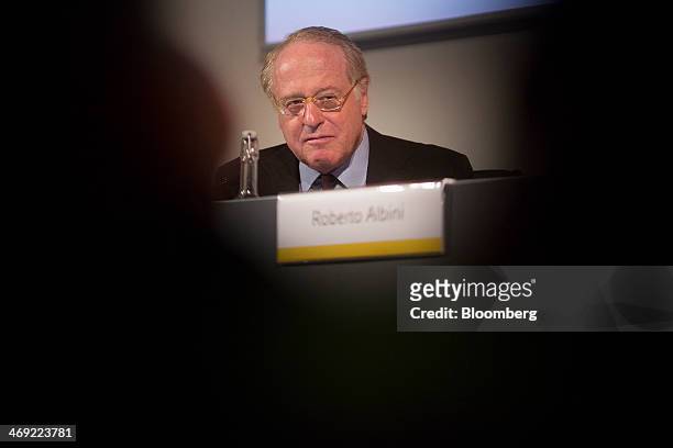 Paolo Scaroni, chief executive officer of Eni SpA, listens during a news conference following the company's 2014-2017 strategy presentation in...