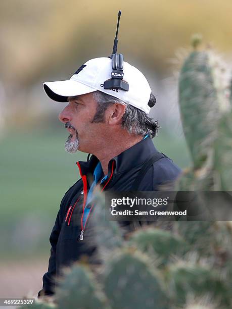 David Feherty of CBS Sports reports on the action during the final round of the Waste Management Phoenix Open at TPC Scottsdale on February 2, 2014...