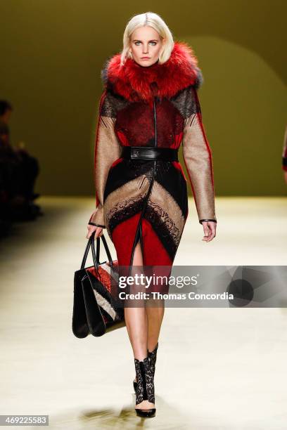 Model walks the runway at J. Mendel during Mercedes-Benz Fashion Week Fall 2014 at The Theatre at Lincoln Center on February 13, 2014 in New York...