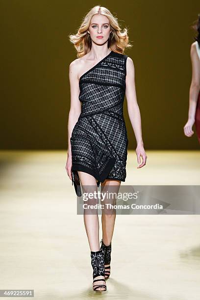 Model walks the runway at J. Mendel during Mercedes-Benz Fashion Week Fall 2014 at The Theatre at Lincoln Center on February 13, 2014 in New York...