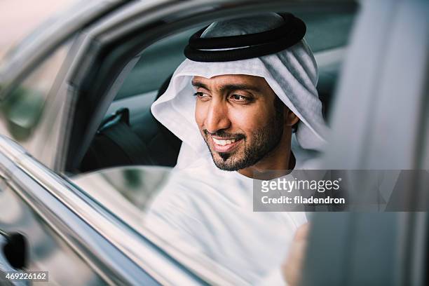 arabic businessman in car - arab lifestyle stockfoto's en -beelden