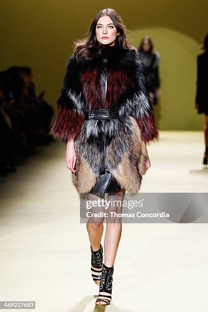 Model walks the runway at J. Mendel during Mercedes-Benz Fashion Week Fall 2014 at The Theatre at Lincoln Center on February 13, 2014 in New York...