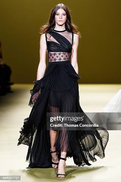 Model walks the runway at J. Mendel during Mercedes-Benz Fashion Week Fall 2014 at The Theatre at Lincoln Center on February 13, 2014 in New York...