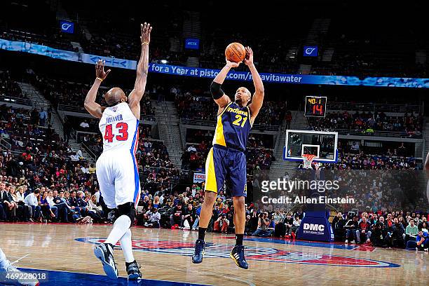 David West of the Indiana Pacers shoots the ball against the Detroit Pistons on April 10, 2015 at The Palace of Auburn Hills in Auburn Hills,...