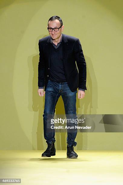 Designer Gilles Mendel walks the runway at the J. Mendel fashion show during Mercedes-Benz Fashion Week Fall 2014 on February 13, 2014 in New York...
