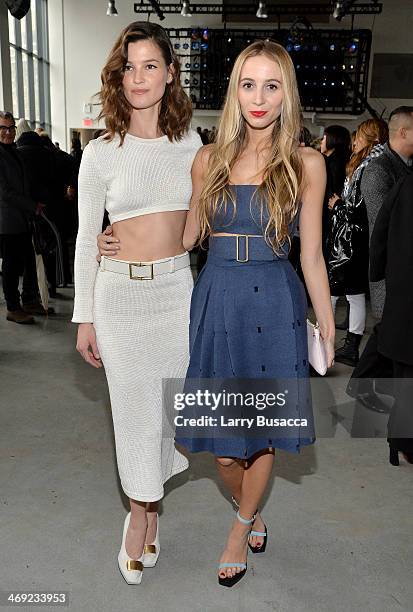 Hanneli Mustaparta and Harley Viera-Newton attend the Calvin Klein Collection fashion show during Mercedes-Benz Fashion Week Fall 2014 at Spring...