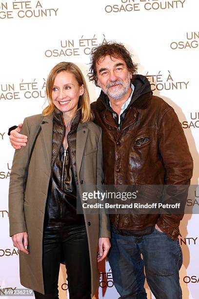 Actor Olivier Marchal with his wife Catherine Marchal attend the 'August : Osage County' : Premiere at Cinema UGC Normandie on February 13, 2014 in...