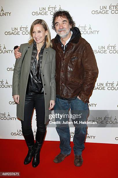 Emmanuel Chain and his wife Catherine attend the 'August : Osage County' Paris premiere at Cinema UGC Normandie on February 13, 2014 in Paris, France.