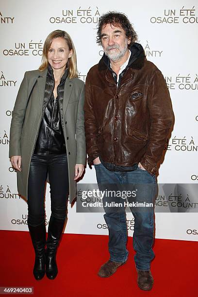 Olivier Marchal and his wife Catherine attend the 'August : Osage County' Paris premiere at Cinema UGC Normandie on February 13, 2014 in Paris,...