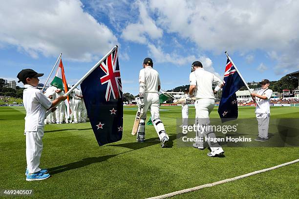 Hamish Rutherford and Peter Fulton of New Zealand take the field during day one of the 2nd Test match between New Zealand and India at Basin Reserve...