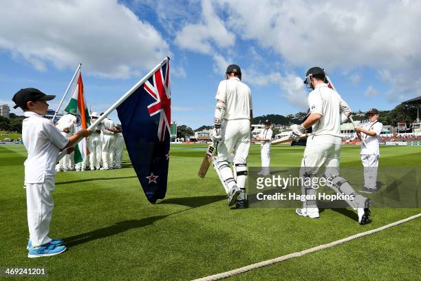 Hamish Rutherford and Peter Fulton of New Zealand take the field during day one of the 2nd Test match between New Zealand and India at Basin Reserve...