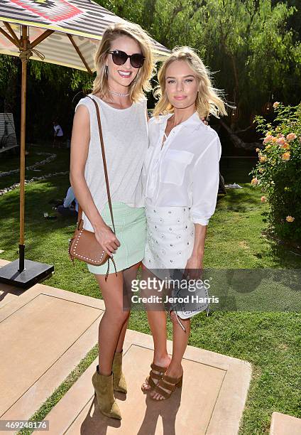 Model Rosie Huntington-Whiteley and actress Kate Bosworth attend Coach Backstage at Soho Desert House on April 10, 2015 in La Quinta, California.