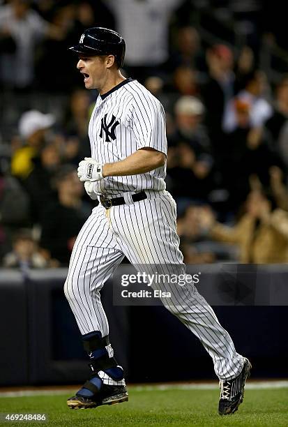 Chase Headley of the New York Yankees celebrates his solo home run in the ninth inning against the Boston Red Sox on April 10, 2015 at Yankee Stadium...
