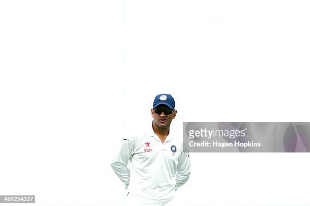 Dhoni of India looks on during day one of the 2nd Test match between New Zealand and India on February 14, 2014 in Wellington, New Zealand.