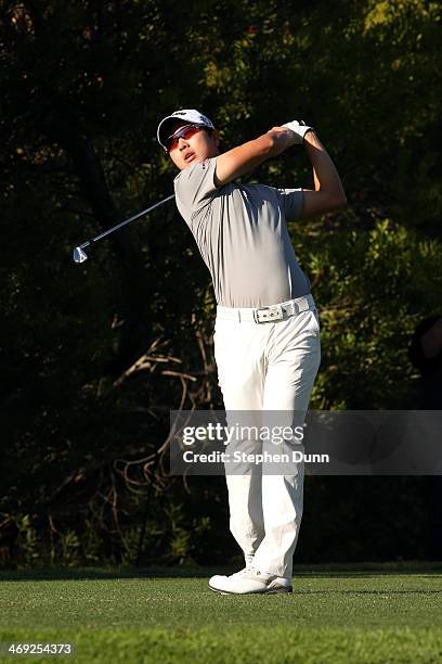 Sang-Moon Bae of Korea hits a tee shot in the first round of the Northern Trust Open at the Riviera Country Club on February 13, 2014 in Pacific...