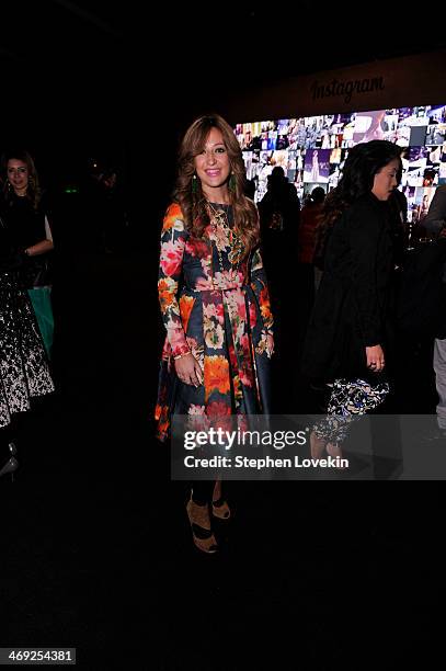 Freida Rothman prepares backstage at the FLT Moda + Art Hearts Fashion show presented by AIDS Healthcare Foundation during Mercedes-Benz Fashion Week...