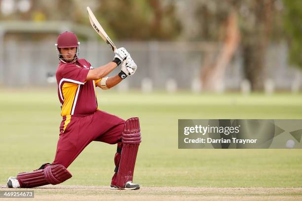 Cameron Trask of Queensland plays a shot during the Imparja Cup match between Queensland and the Northern Territory at Jim McConville Oval on...