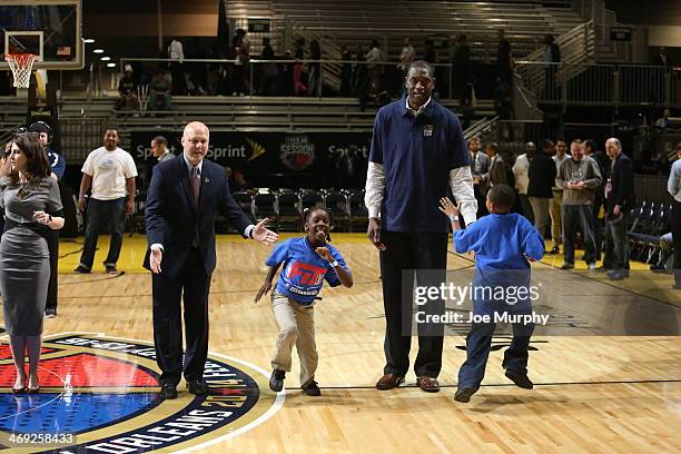 New Orleans Mayor Mitch Landrieu and former NBA Player Dikembe Mutombo participate in a Youth Celebration during the 2014 NBA All-Star Jam Session at...