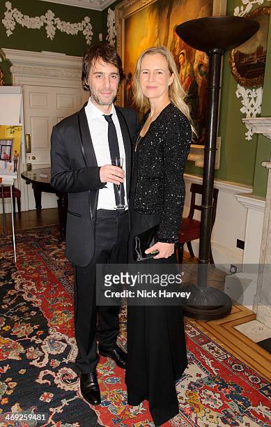 Alex Cochrane and Alannah Weston attend the Tokens of Love Dinner in aid of CORAM at The Foundling Museum on February 13, 2014 in London, England.