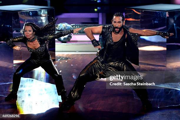 Minh-Khai Phan-Thi and Massimo Sinato perform on stage during the 4th show of the television competition 'Let's Dance' on April 10, 2015 in Cologne,...