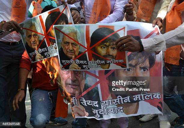Hindu sena activist conducts protest & burn posters against J&K chief minister Mufti Mohammad Sayeed & the JKLF chairman Yasin Malik after their...