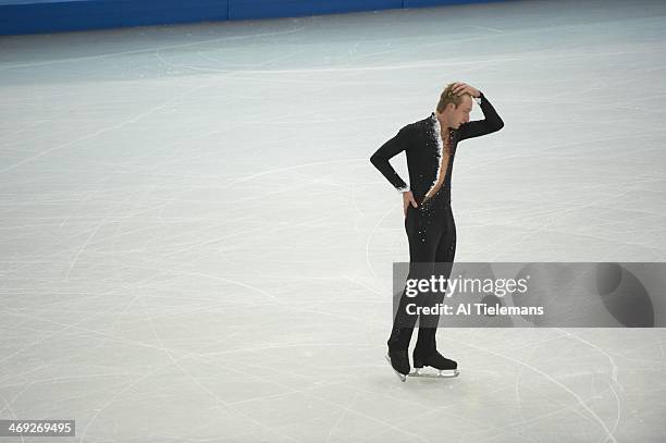 Winter Olympics: Russia Evgeny Plushenko sustaining injury during warmups before Men's Short Program at Iceberg Skating Palace. Sochi, Russia...