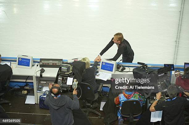 Winter Olympics: Aerial view of Russia Evgeny Plushenko sustaining injury during warmups and talking with judge before Men's Short Program at Iceberg...