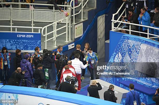 Winter Olympics: View of Russia Evgeny Plushenko exiting the ice after sustaining injury during warmups before Men's Short Program at Iceberg Skating...
