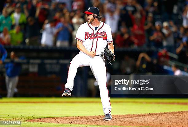 Jason Grilli of the Atlanta Braves reacts after striking out Lucas Duda of the New York Mets in the ninth inning to give the Braves a 5-3 win during...