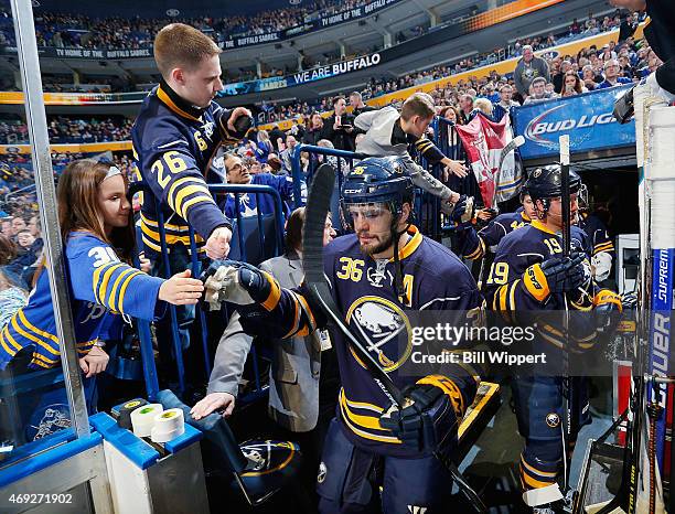 Fans cheer as Patrick Kaleta of the Buffalo Sabres heads to the ice for a game against the Toronto Maple Leafs on April 1, 2015 at the First Niagara...