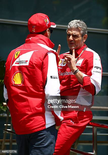 Ferrari Team Principal Maurizio Arrivabene chats with Sebastian Vettel of Germany and Ferrari during final practice for the Formula One Grand Prix of...