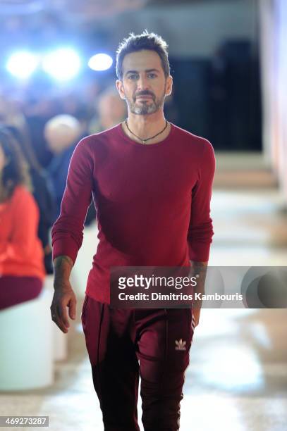 Designer Marc Jacobs walks the runway at the Marc Jacobs fashion show during Mercedes-Benz Fashion Week Fall 2014 at Lexington Avenue Armory on...