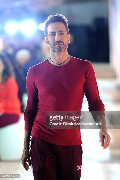 Designer Marc Jacobs walks the runway at the Marc Jacobs fashion show during Mercedes-Benz Fashion Week Fall 2014 at Lexington Avenue Armory on...