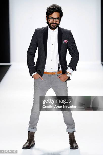 Designer Altaf Maaneshia walks the runway at the FLT Moda + Art Hearts Fashion show presented by AIDS Healthcare Foundation during Mercedes-Benz...