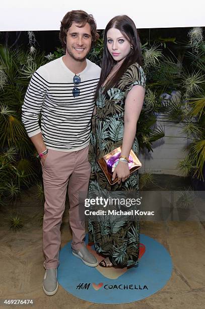 Actors Diego Boneta and Michelle Trachtenberg attend the Official H&M Loves Coachella Party at the Parker Palm Springs on April 10, 2015 in Palm...
