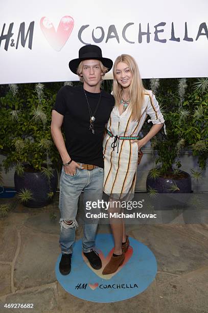 Singer Cody Simpson and model Gigi Hadid attend the Official H&M Loves Coachella Party at the Parker Palm Springs on April 10, 2015 in Palm Springs,...