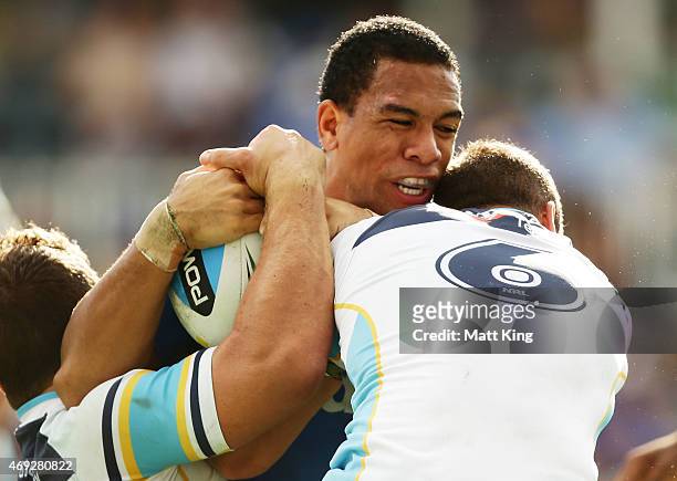 Will Hopoate of the Eels is tackled during the round six NRL match between the Parramatta Eels and the Gold Coast Titans at Pirtek Stadium on April...