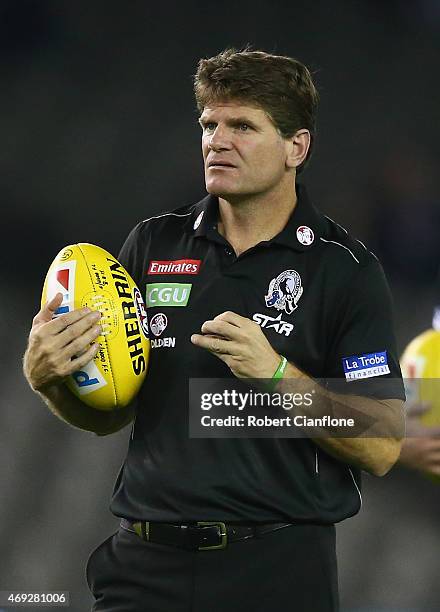 Magpies midfield coach Robert Harvey looks on during the warm up session prior to the round two AFL match between the Collingwood Magpies and the...