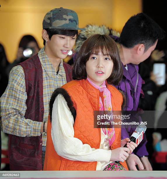 Jin-Young of B1A4 and Sim Eun-Kyung attend the movie 'Miss Granny' free hug event at Times Square on February 13, 2014 in Seoul, South Korea.
