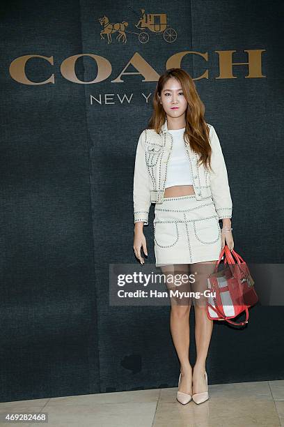 Soyou of South Korean girl group SISTAR attends the renewal opening for the COACH at Lotte Department Store on April 10, 2015 in Seoul, South Korea.