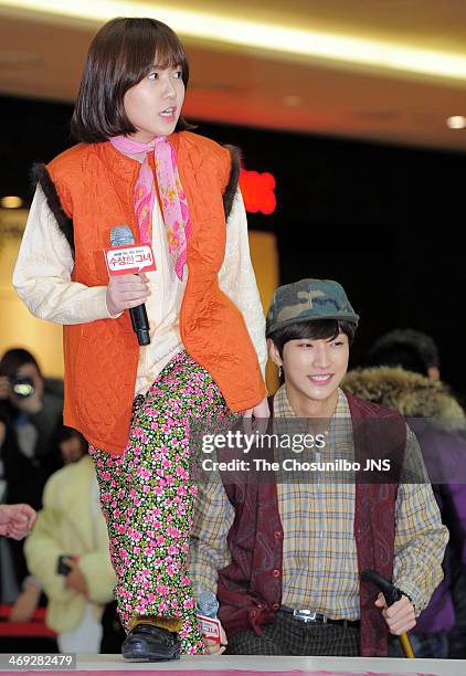 Sim Eun-Kyung and Jin-Young of B1A4 attend the movie 'Miss Granny' free hug event at Times Square on February 13, 2014 in Seoul, South Korea.