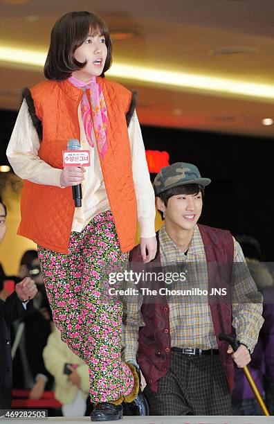 Sim Eun-Kyung and Jin-Young of B1A4 attend the movie 'Miss Granny' free hug event at Times Square on February 13, 2014 in Seoul, South Korea.