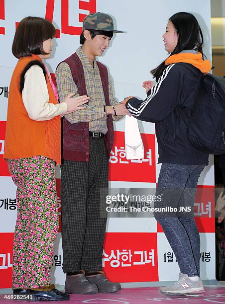 Sim Eun-Kyung and Jin-Young of B1A4 attend the movie 'Miss Granny' free hug event at Times Square on February 13, 2014 in Seoul, South Korea.