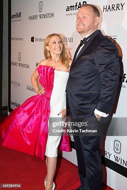 Kylie Minogue and Kevin Robert Frost attend the 5th Annual amfAR Inspiration Gala at the home of Dinho Diniz on April 10, 2015 in Sao Paulo, Brazil.