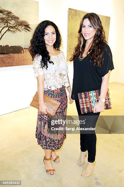 Diana Murcia and Michelle Rivera attend Andrew Levitas Metalwork Playground opening reception at Blueshift Wynwood on April 10, 2015 in Miami,...
