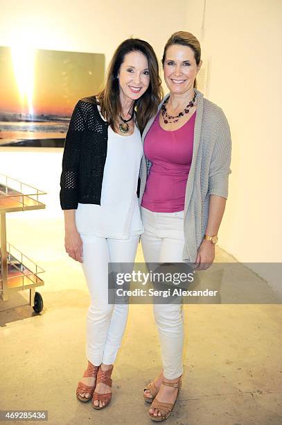 Annette Victoria and Annmarie Lind attend Andrew Levitas Metalwork Playground opening reception at Blueshift Wynwood on April 10, 2015 in Miami,...