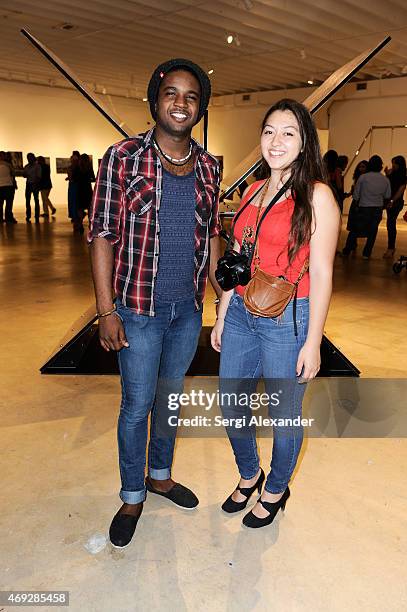 Brian Jean and Veronica Fajardo attend Andrew Levitas Metalwork Playground opening reception at Blueshift Wynwood on April 10, 2015 in Miami, Florida.