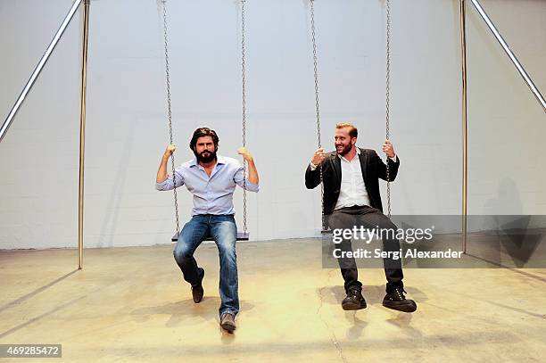 Artist Andrew Levitas and Eduardo Burillo attend Andrew Levitas Metalwork Playground opening reception at Blueshift Wynwood on April 10, 2015 in...