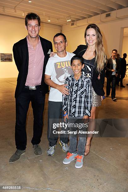 William Chewning, Nino and Vanessa Moravo attend Andrew Levitas Metalwork Playground opening reception at Blueshift Wynwood on April 10, 2015 in...